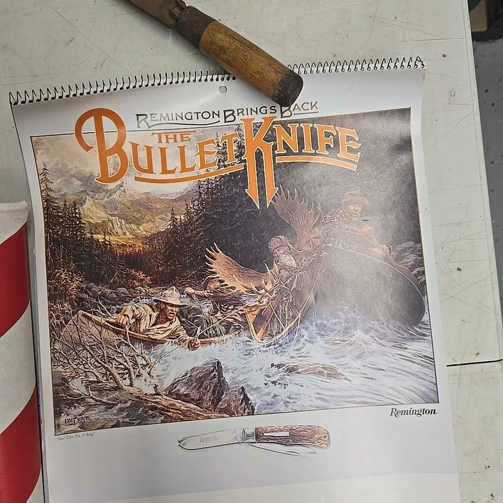 1996 Remington Bullet Knife Mini Trapper Calendar 30x20‎